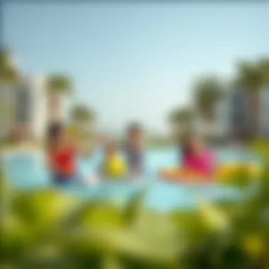 Families enjoying recreational activities at Kornish Al-Qawasem